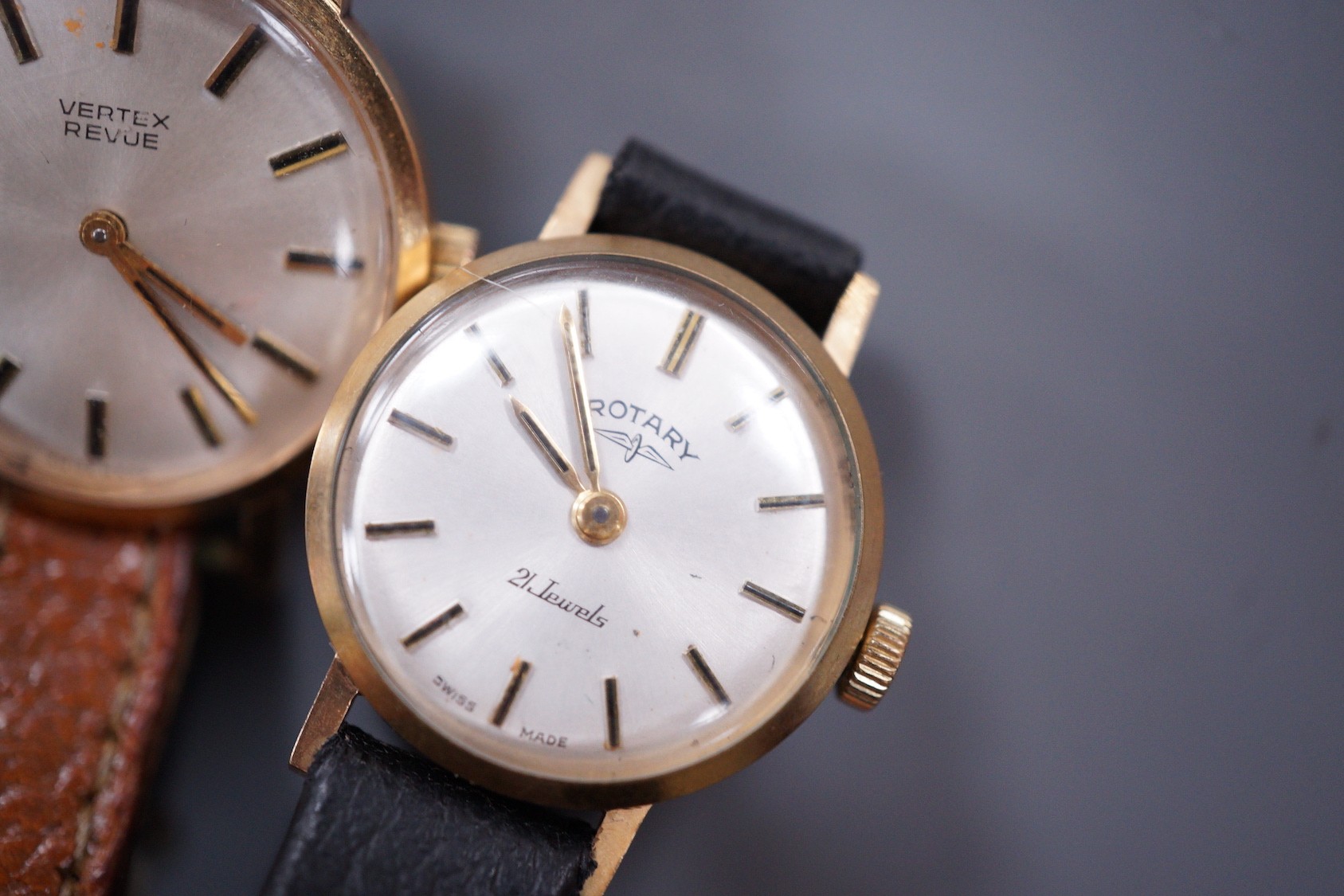 Three assorted lady's 9ct gold manual wind wrist watches, including a Vertex Revue and Rotary on leather straps and half hunter on damaged 9ct bracelet.